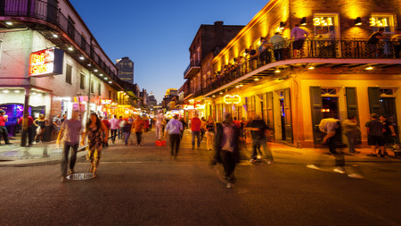 Bourbon Street in the French Quarter of New Orleans as night falls and the lights come onのeditorial素材