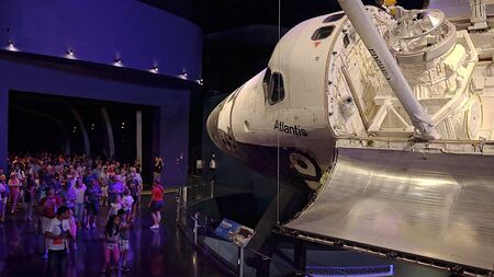 CAPE CANAVERAL, FLORIDA - JUNE 14th: A crowd of visitors view the space shuttle Atlantis at the Kennedy Space Center in Cape Canaveral, Florida on June 14th, 2016.のeditorial素材