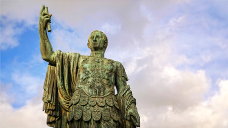 Statue of emperor Julius Caesar along Via dei Fori Imperiali at the Roman Forum in Rome, Italyの写真素材