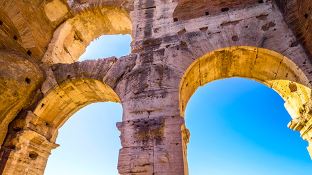 Roman Colosseum interior arch shows architectural details in Rome, Italyの写真素材