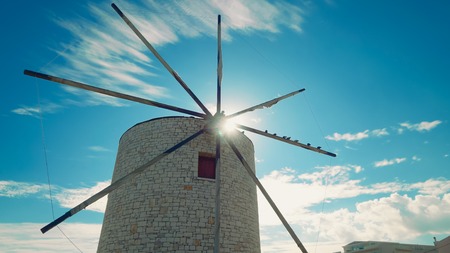 Traditional stone Greek windmill on Corfu island, Greeceの写真素材