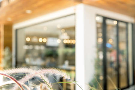 Abstract blurred restaurant window - vintage style picture with bokeh light.の写真素材