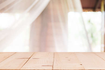 Vintage white mosquito curtain in a hut or house in a tropical hotel resort.の写真素材