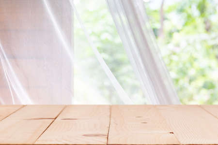 Vintage white mosquito curtain in a hut or house in a tropical hotel resort.の写真素材