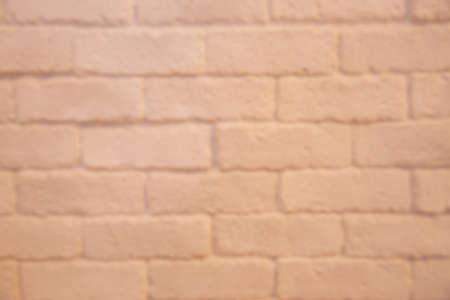 Blur abstract image of orange brick wall. For wallpaper. Empty space for text or product presentation. Backround concept.の写真素材