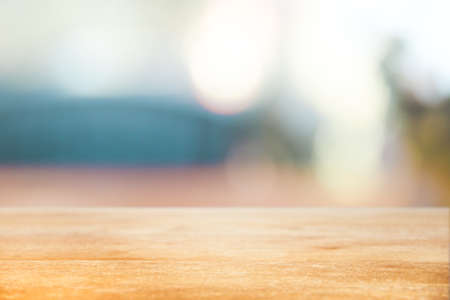 Christmas holiday background with empty wooden table top over festive bokeh light decorate on tree. - Using for Mock up template for display of your design,Banner for advertise of product.の写真素材