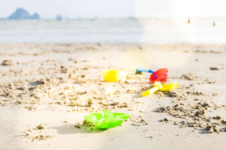 playing beach toy and  sea beach. Kids having fun outdoors. Summer vacation and healthy lifestyle concept.の写真素材