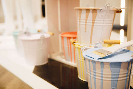 Paint brush with color cans or tanks. Background concept. Colorful pastel art.の写真素材