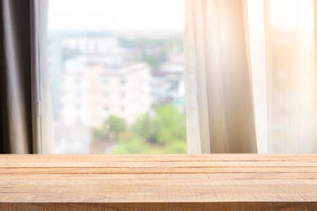 Defocused curtain window and stationery box with sunlight. For montage product display or design key visual layoutの写真素材