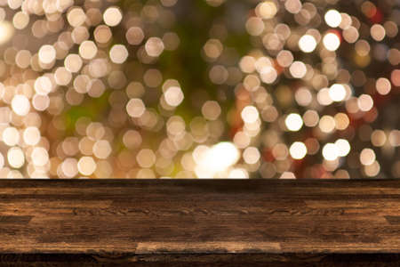 Christmas holiday background with empty wooden table top over festive bokeh light decorate on tree. For create montage product display - Imageの写真素材