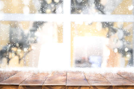 Christmas holiday xmas decorations background with empty wood table. In winter season.の写真素材