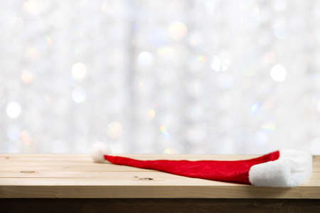 Wood table top with blur of lighting in christmas festival. selective focus.celebration conceptの写真素材