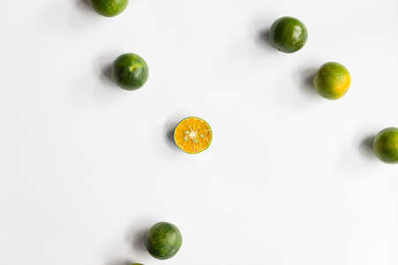 Top view, flat lay of fresh mandarin oranges on white background with copy space. Fruit compositionの写真素材