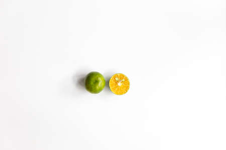Top view, flat lay of fresh mandarin oranges on white background with copy space. Fruit compositionの写真素材