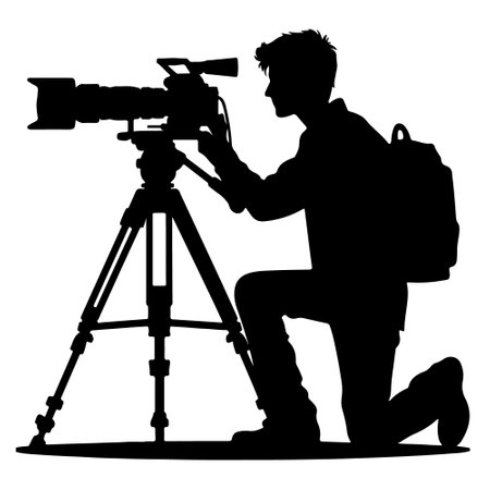 Silhouette of a cameraman with a camera on a white background