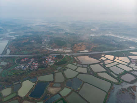 Spring aerial scenery of Baoan Lake and Zhaoshan Forest Park in Huangshi, Hubeiの写真素材