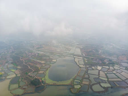 Spring aerial scenery of Baoan Lake and Zhaoshan Forest Park in Huangshi, Hubeiの写真素材