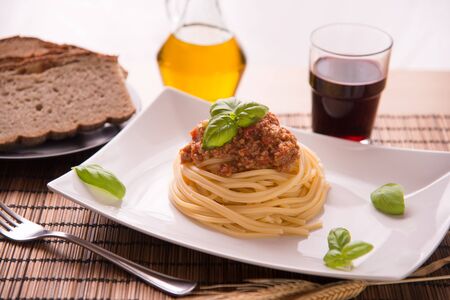 Italian spaghetti dressed with Bolognese vegan sauceの写真素材