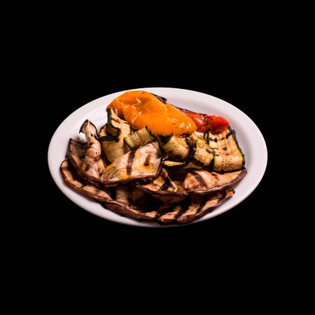 Grilled vegtables on black background still lifeの写真素材