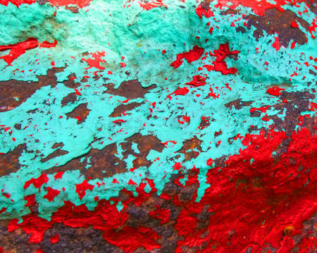 Old painted granite stone rock background. Blue, cyan, turquoise, aquamarine, red colors.の写真素材
