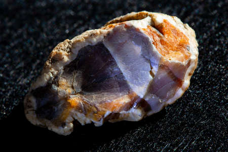 Raw agate quartz minerals nugget from Novy Urengoy, Russia. A backlight photo of stone isolated on...