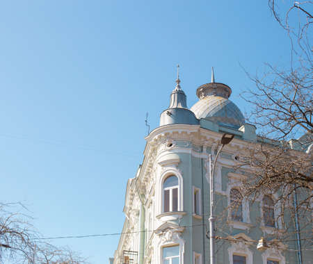 Odessa, Ukraine - 04 22 21: light blue neo-baroque building facade in the city center. Early sprig tender light photoのeditorial素材
