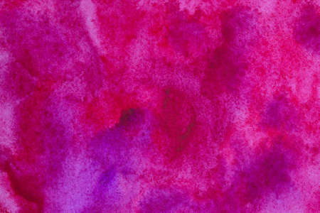 Bright vibrant pink purple hand painted watercolor background.の写真素材