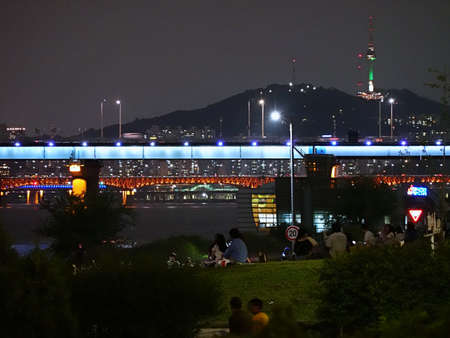 A beautiful sky, landscape in Seoul, South Korea. Where you can see the Seoul Tower after a pink sunset & night view.の写真素材
