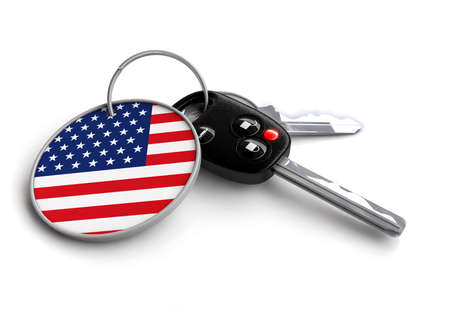 Car keys with flag as keyring - concept for cars made in United Statesの写真素材