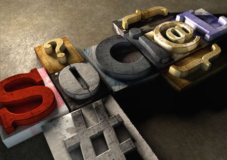 Wooden printing blocks form word 'Social'. Concept for social media and how far mass communication...