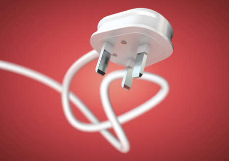 Electrical appliance plug attached to electricity cable. Strong depth of field. White plug and cable...