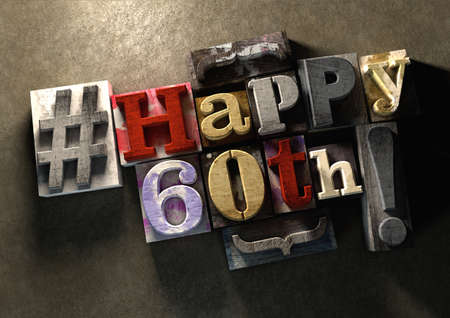 Ink splattered printing wood blocks with grungy Happy 60th birthday typography. Social media hashtag gives a modern edgy graphic design feel. Trendy happy birthday title, for use on birthday card.の写真素材