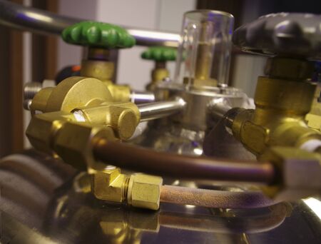 Cryogenic vessel. Pipes and valves. Tanker with liquid nitrogen. Cold steam metal pipeの写真素材