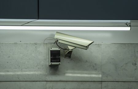 CCTV security camera installed in airport and subway for security guard monitoring and surveillance for not let bad things happen.の写真素材