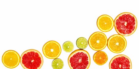 Creative sample of lime, orange and grapefruit. flat lay. Food concept. Lime, orange and grapefruit on a white background. Flat layout.の写真素材