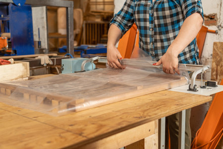 Packing wooden products in the workshopの写真素材