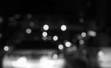 blur abstract bokeh of street city night light background,abstract traffic background,black and white toneの写真素材