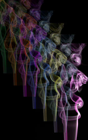 A multicoloured trail of smokeの写真素材
