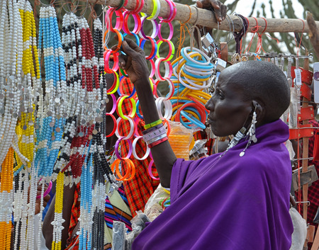 Masai woman in a traditional Tanzanian marketのeditorial素材