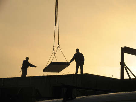 Constructing apartments at overtime.の写真素材