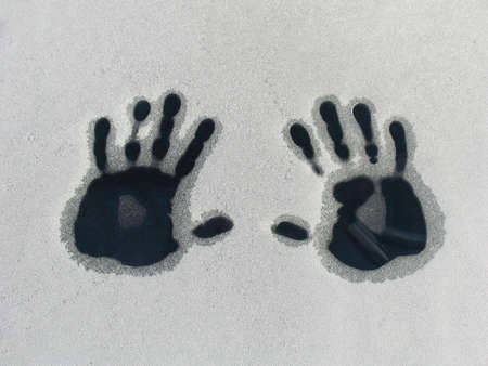 Warm hands on a cold car some frosty winter morning. - No unsharpen mask.の写真素材
