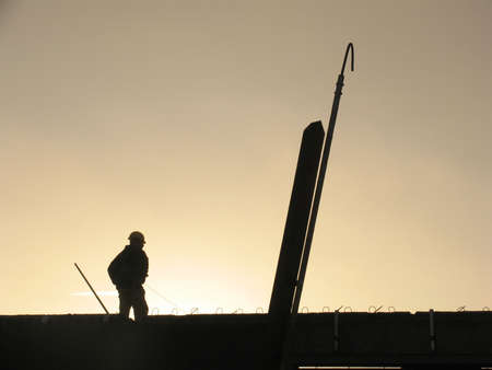 Constructing apartments at overtime.の写真素材