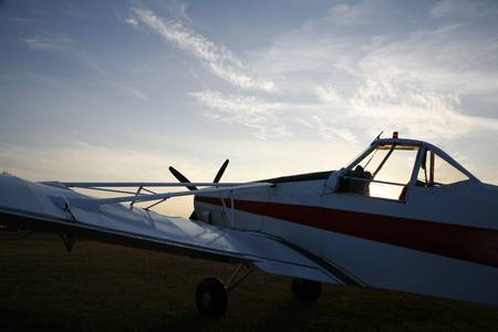Aeroplane used for pulling up gliders in low evening sun - Arnborg, Denmark.