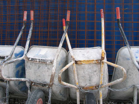 Chained wheel barrows after work.
