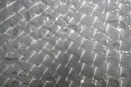 Detail of cafe table after rain.