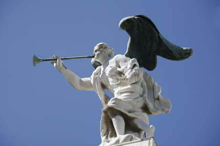 Veneian marble angel with bronze wings and trombone.の写真素材