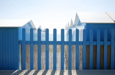 Nice blue beach huts at the Italian Riviera.の写真素材
