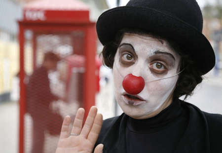 SVENDBORG, DK - MAY 22: The sad clown performing in the street during 12th International Clown Festival   May 22, 2010 Svendborg, Denmark.のeditorial素材