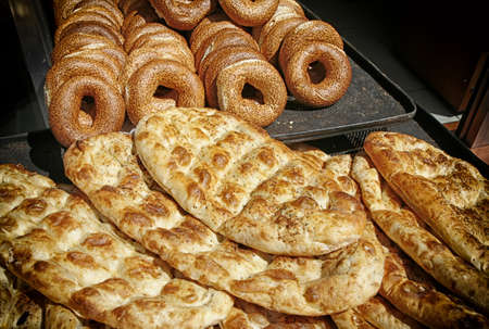 Freshly baked bread in the doorway of a bakers shop in Istanbul, Turkey の写真素材