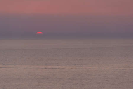 Golden sunset at the sea, summer romance. South resort.の写真素材